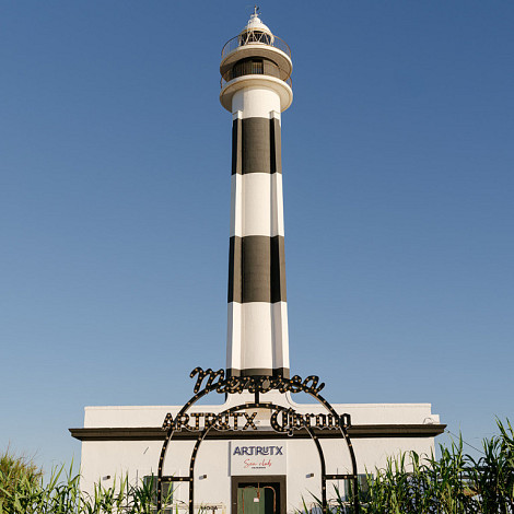 Artrutx Sea Club in Cala’n Bosch, seafront restaurant by the Cap d’Artrutx Lighthouse.